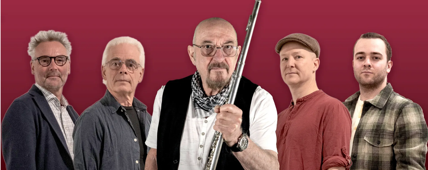 A group of men posing for a photo