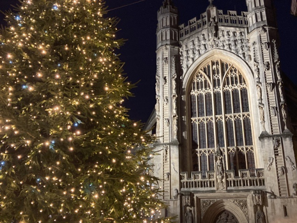 A Christmas tree in front of a church